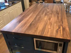 custom kitchen island with storage and wood top